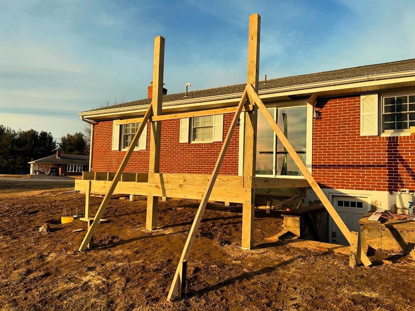 Finished covered porch by Ridgeline Carpentry LLC
