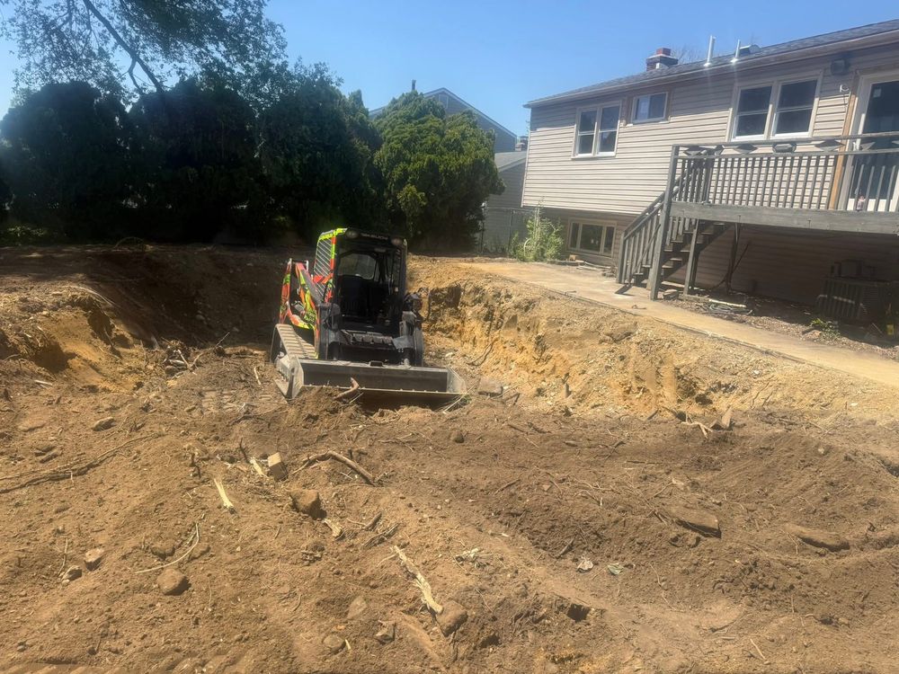 Backyard with old in-ground pool before demolition down to subgrade