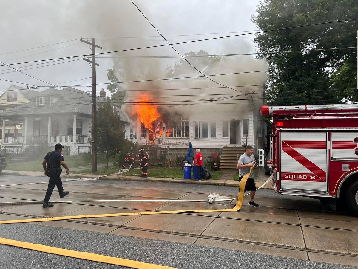 CHFC Squad 3 firefighter operating at a structure fire