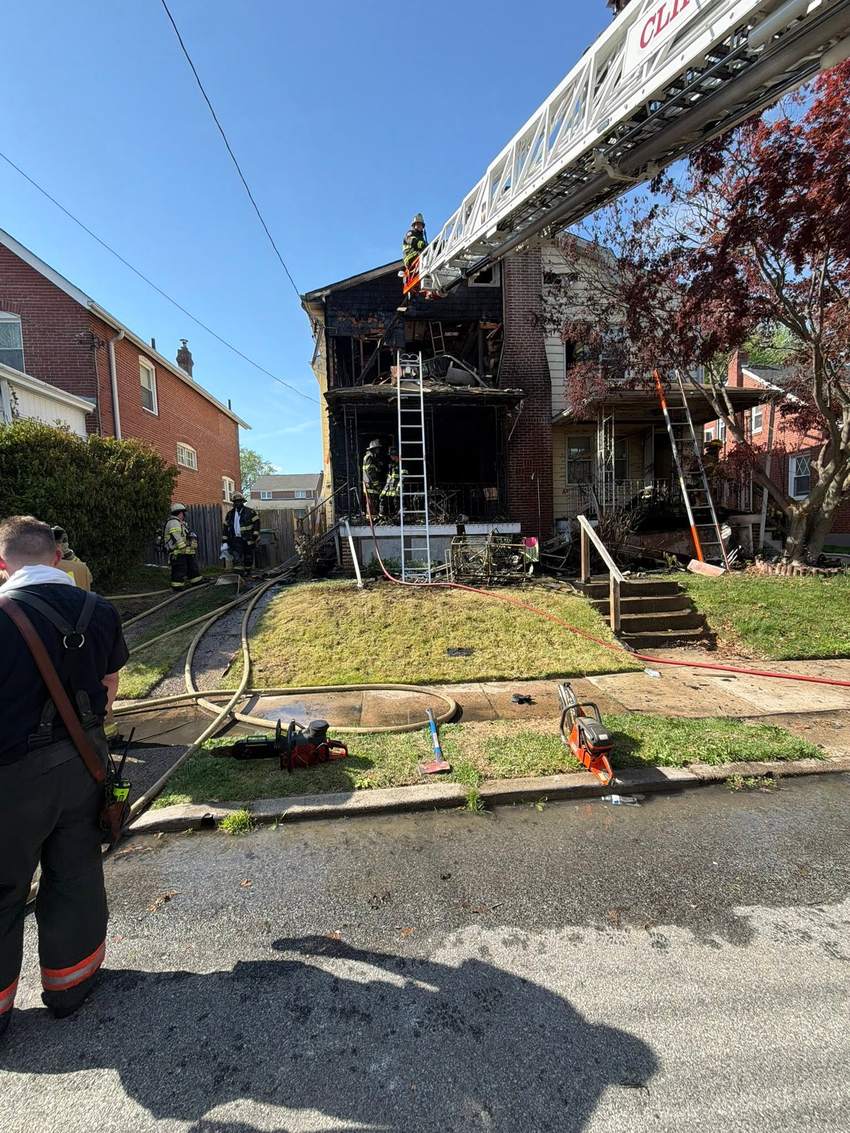 CHFC aerial ladder working a house fire